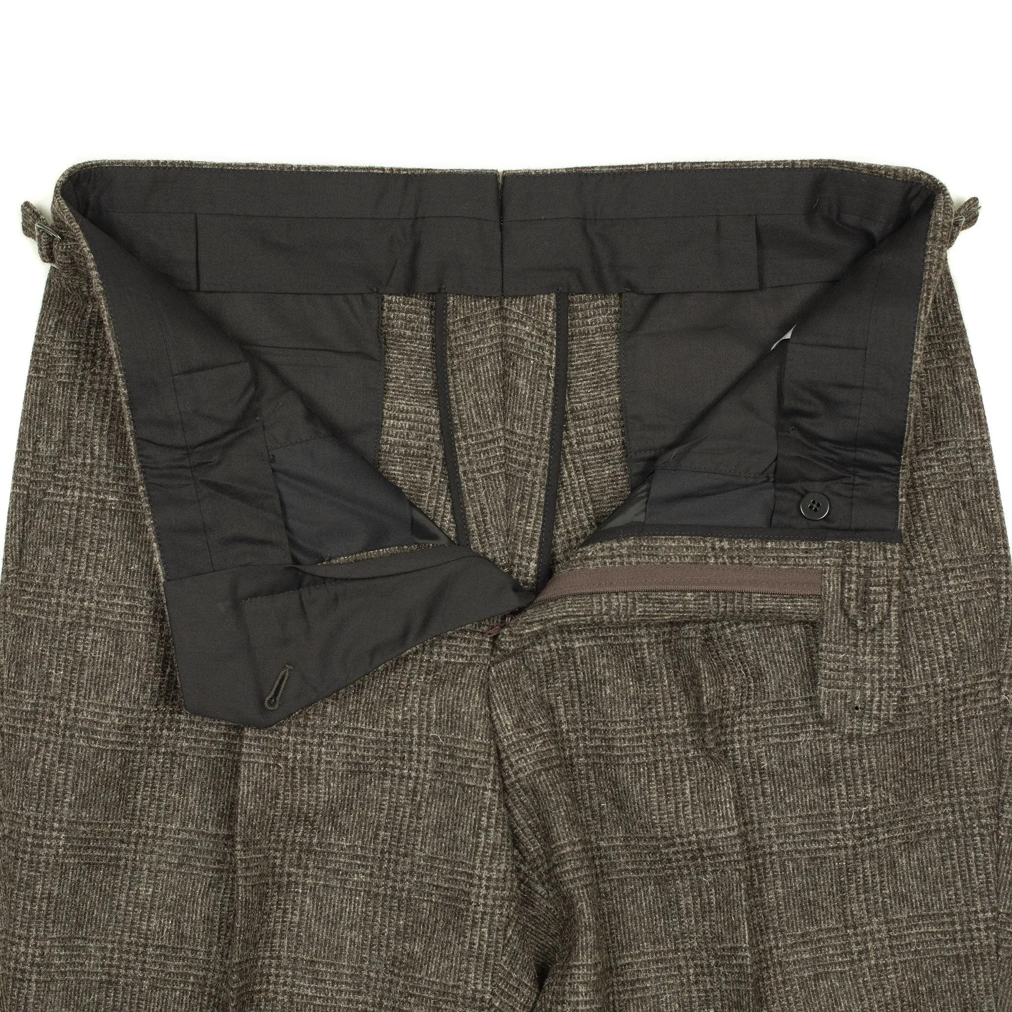 x Sartoria Carrara: Pleated trousers in tonal charcoal Prince-of-Wales undyed wool